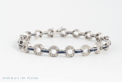 Articulated bracelet in 750°/°° white gold...