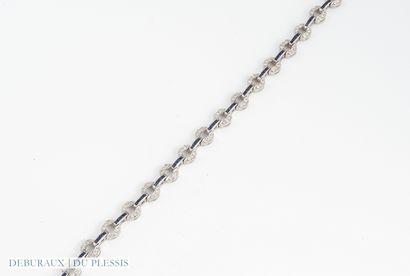 Articulated bracelet in 750°/°° white gold...