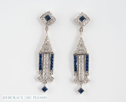 Pair of geometrical earrings in white gold...