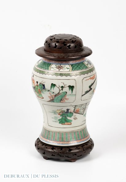 Porcelain vase decorated with green family...