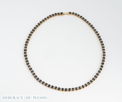 Line necklace in 750°/°° gold set with navette...