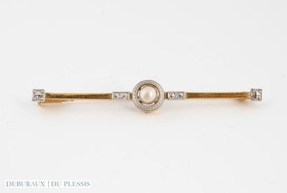 Barrette brooch in two 750°/°° golds adorned...