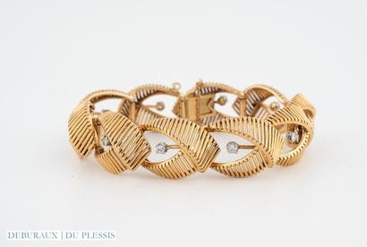 Articulated bracelet in 750°/°° gold and...