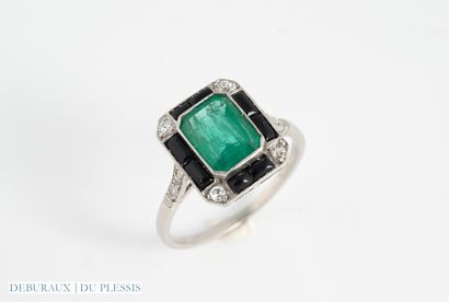 Art Deco platinum ring set with an emerald...