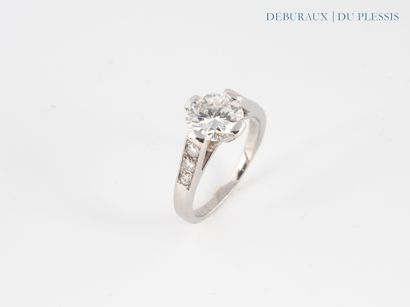 Solitaire ring in 750°/°° white gold set...