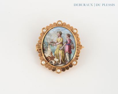 750°/°° gold brooch set with an enameled...