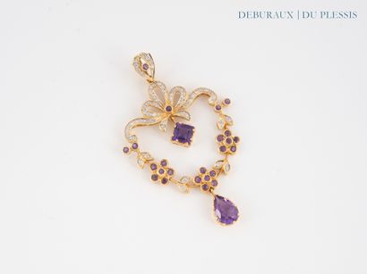 Bow pendant in 750°/°° gold with foliage...