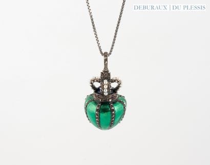 Green enameled silver chain and opening pendant...