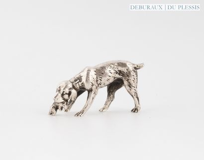 Dog holding a hare in 925°/°° silver.
6 x...