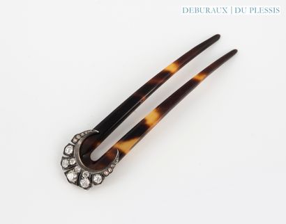 Tortoiseshell comb adorned with a crescent...