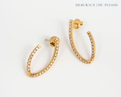 Pair of earrings in 750°/°° gold set with...