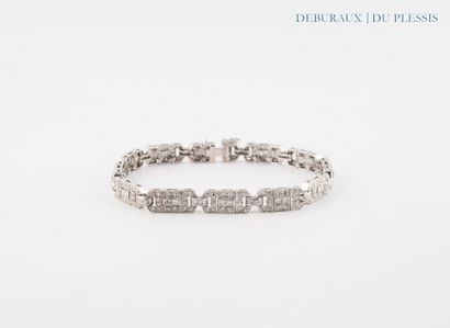Bracelet articulé en or gris 750°/°° orné...