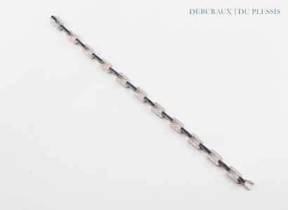 Articulated bracelet in 750°/°° white gold...