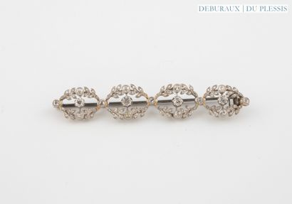 Platinum barrette brooch set with four white...