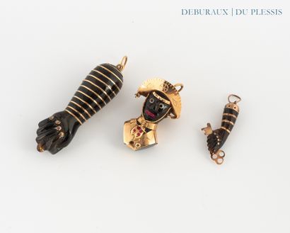 Set of three pendants, two of which are lucky...
