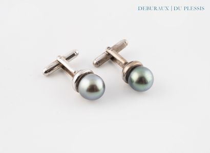 Pair of 800°/°° silver cufflinks adorned...
