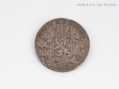 Une pièce en argent Léopold II 5 francs belge.
Poids...