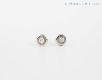 Pair of platinum ear chips set with a brilliant-cut...