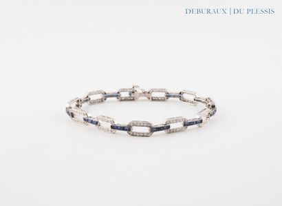 Articulated bracelet in 750°/°° white gold...