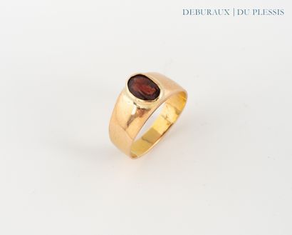 Bague chevalière en or 750°/°° sertie clos...