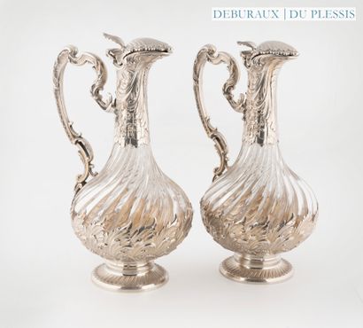 Pair of cut crystal ewers with twisted ribs...