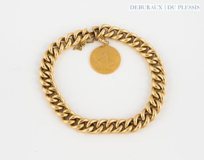 Gourmette bracelet in 750°/°° gold with a...