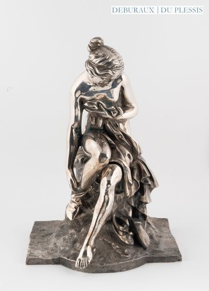 Woman bathing in silver-plated bronze.
H....