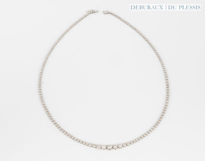 River necklace in platinum set with a line...