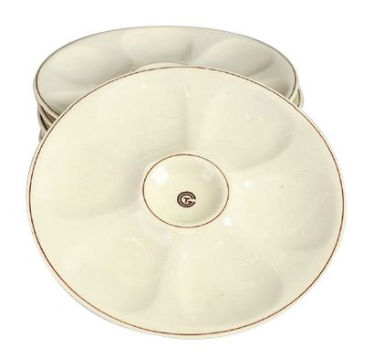 6 Assiettes à huîtres destinées à la table...