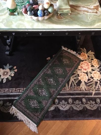 Petit tapis mécanique à décor vert