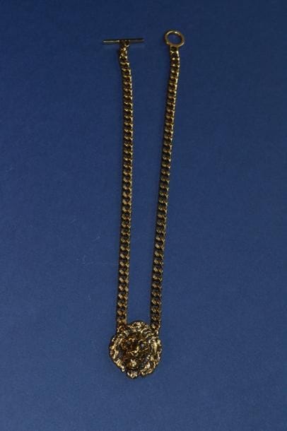 SAINT LAURENT PARIS. Collier à décor de lion...