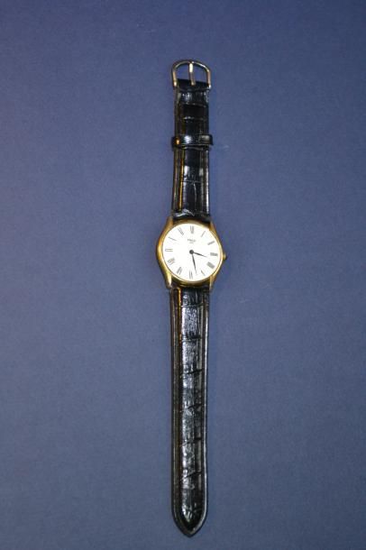 FRED. Montre en plaqué or.