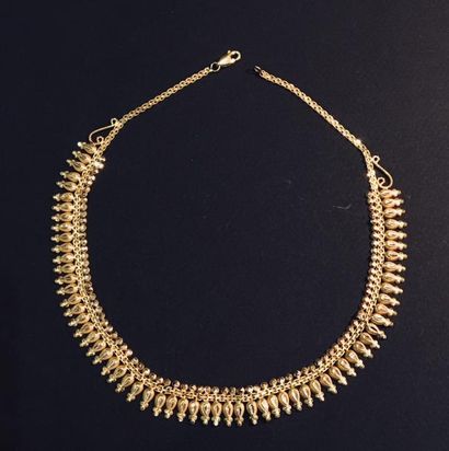 Collier draperie en or 750°/°°.Poids : 25,6...