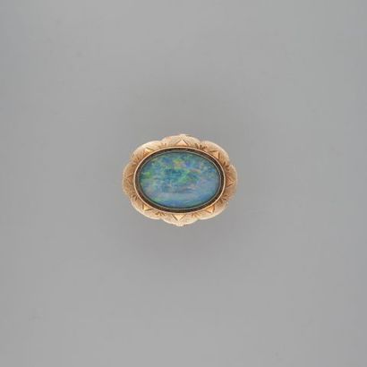 Bague en or 750 °/°° ornée d'un doublet de...