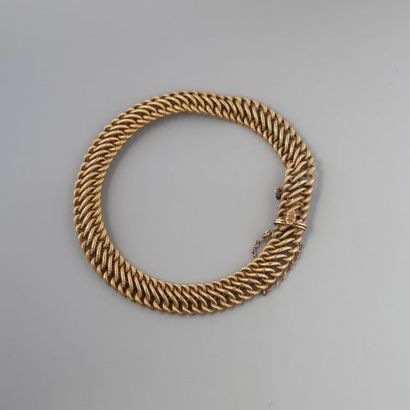 Bracelet gourmette en or 750 °/°° à maille...