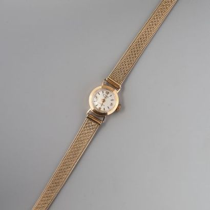 Bracelet montre de dame Elgé en or 750°/°°...