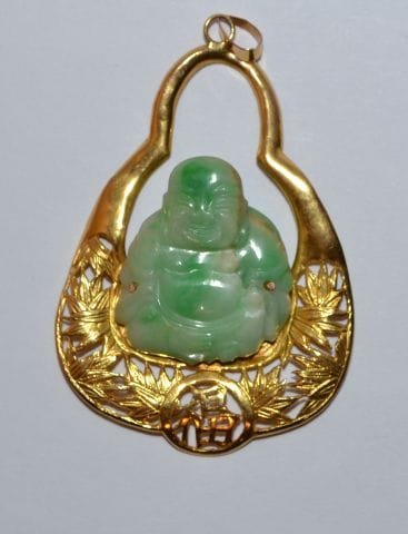 Pendentif en or 750 °/°° orné d'un bouddha...