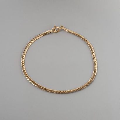 Bracelet en or 750 °/°° maille gourmette...