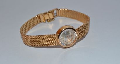 Bracelet montre de dame Titan en or 750 °/°°,...