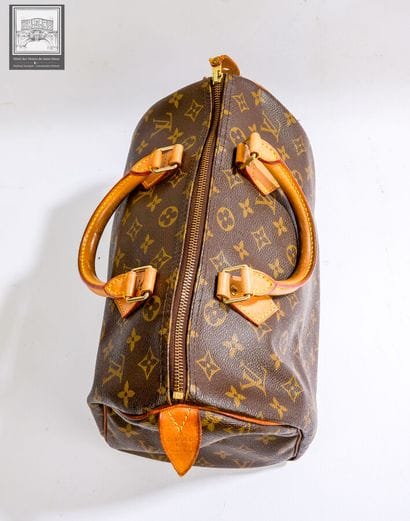 LOUIS VUITTON,
Sac modéle Speedy 30 en cuir...