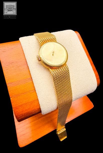 OMEGA, montre bracelet de dame rond
Or jaune...