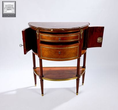Console demi-lune 
Acajou et placage d'acajou...