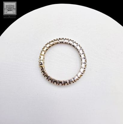 Bague alliance américaine
en or gris 18K...