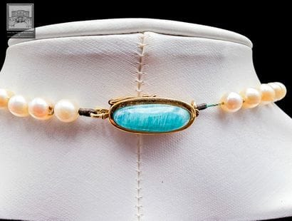 Collier de perles de culture en chute
Fermoir...