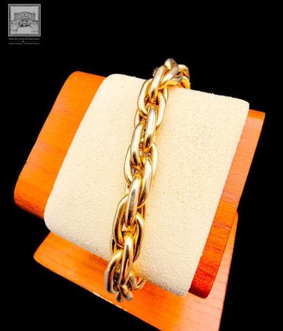 Flexible 18K yellow gold bracelet (750/°°°),...