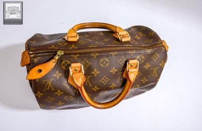 LOUIS VUITTON,
Sac modéle Speedy 30 en cuir...