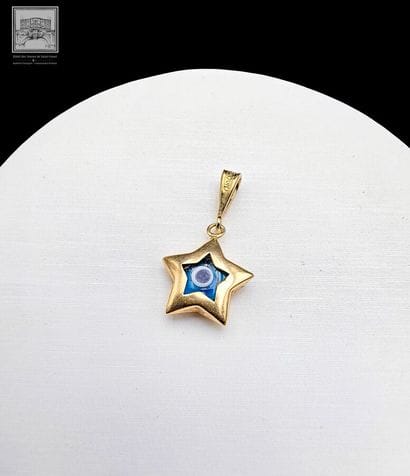 Pendentif en or jaune 18K 750/°°°
Poinçon...