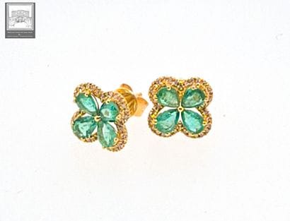 Pair of ear studs in 750°/.(18K) 1g65 yellow...