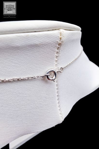 Necklace + Pendant
750/°°° white gold, eagle-head...