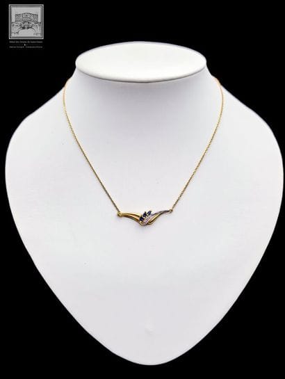 Collier
or jaune et gris 750/°°°
Poinçon...